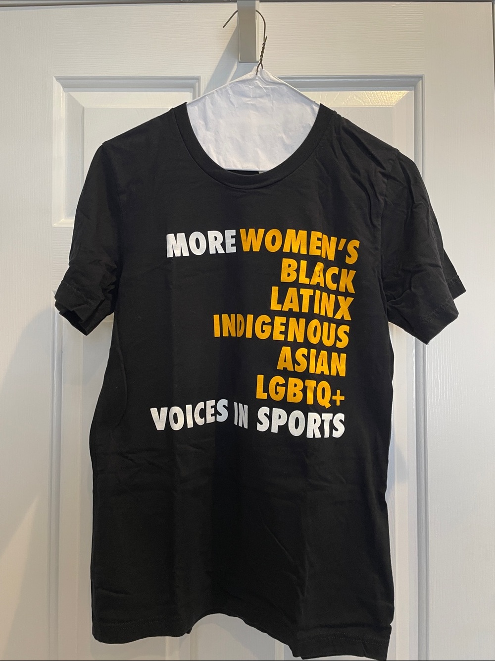 “More *** Voices in Sports” black unisex t-shirt by Bellas + Canvas Size Small